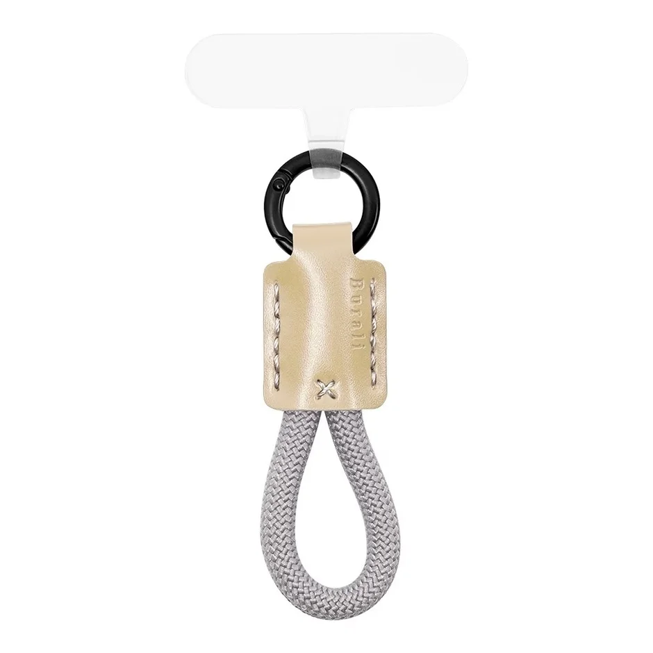 白い背景に、ベージュのレザー部分に「Burali」の文字が刻印された、黒いカラビナ付きの灰色のロープ製ハンドストラップが写っています。